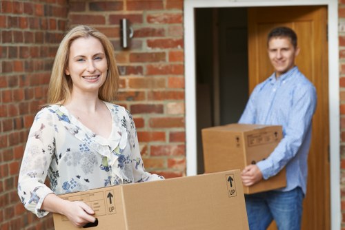 Apartment moving boxes and furniture prepared for flat removals in Palmersgreen