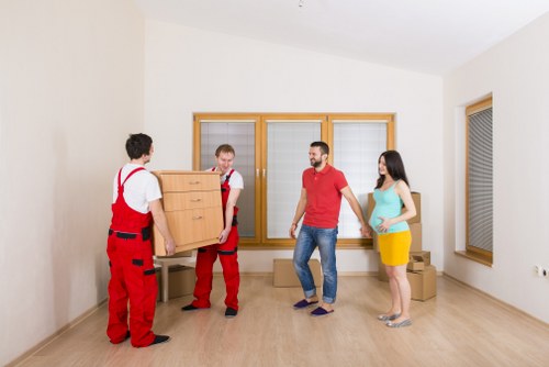 Removal van loading furniture during a Palmersgreen house move